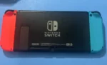 Nintendo Switch with Neon Blue and Neon Red Joy Con Bundle Complete - Image 6