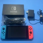 Nintendo Switch with Neon Blue and Neon Red Joy Con Bundle Complete